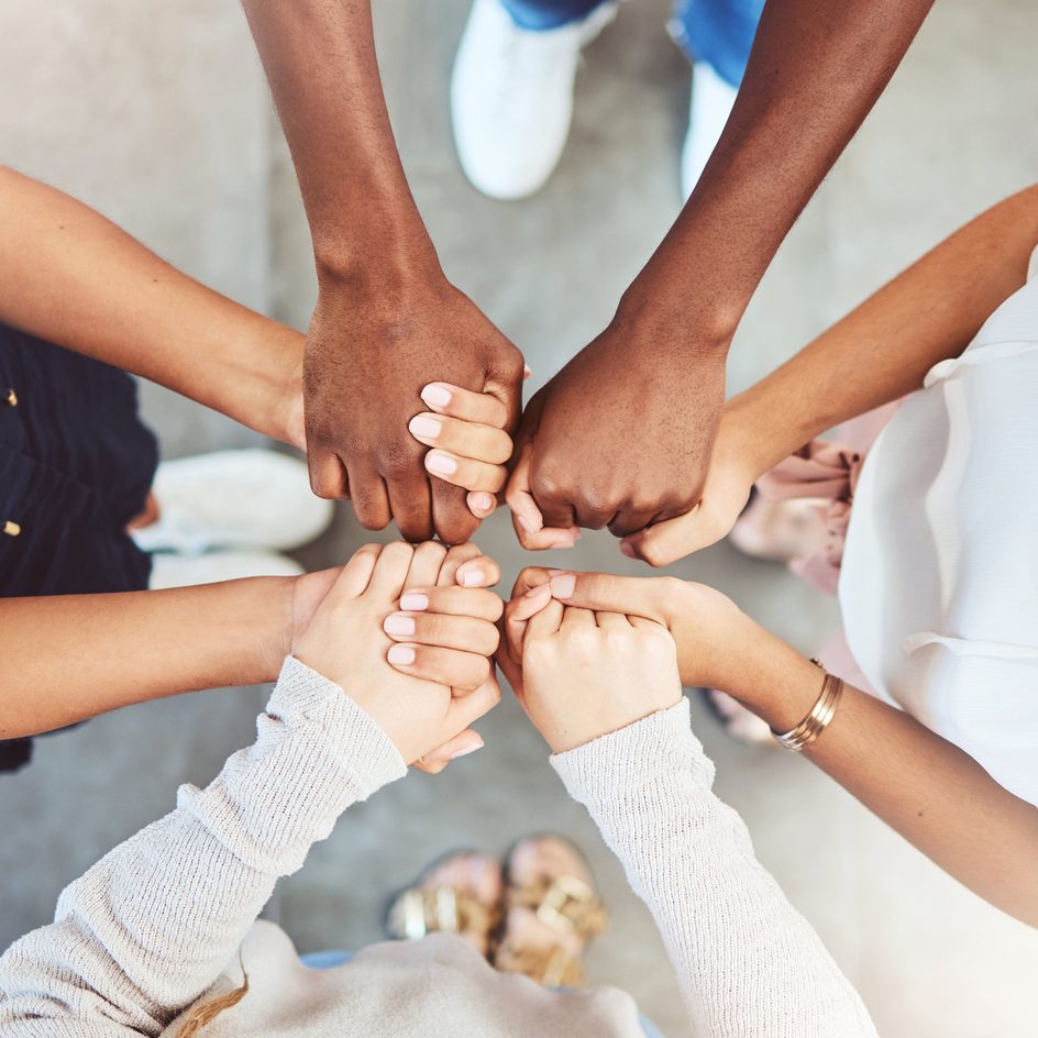 Holding hands, faith and prayer support group of people or friends with hope, religion and trust or respect. Together, helping and love community with commitment, solidarity and teamwork from above